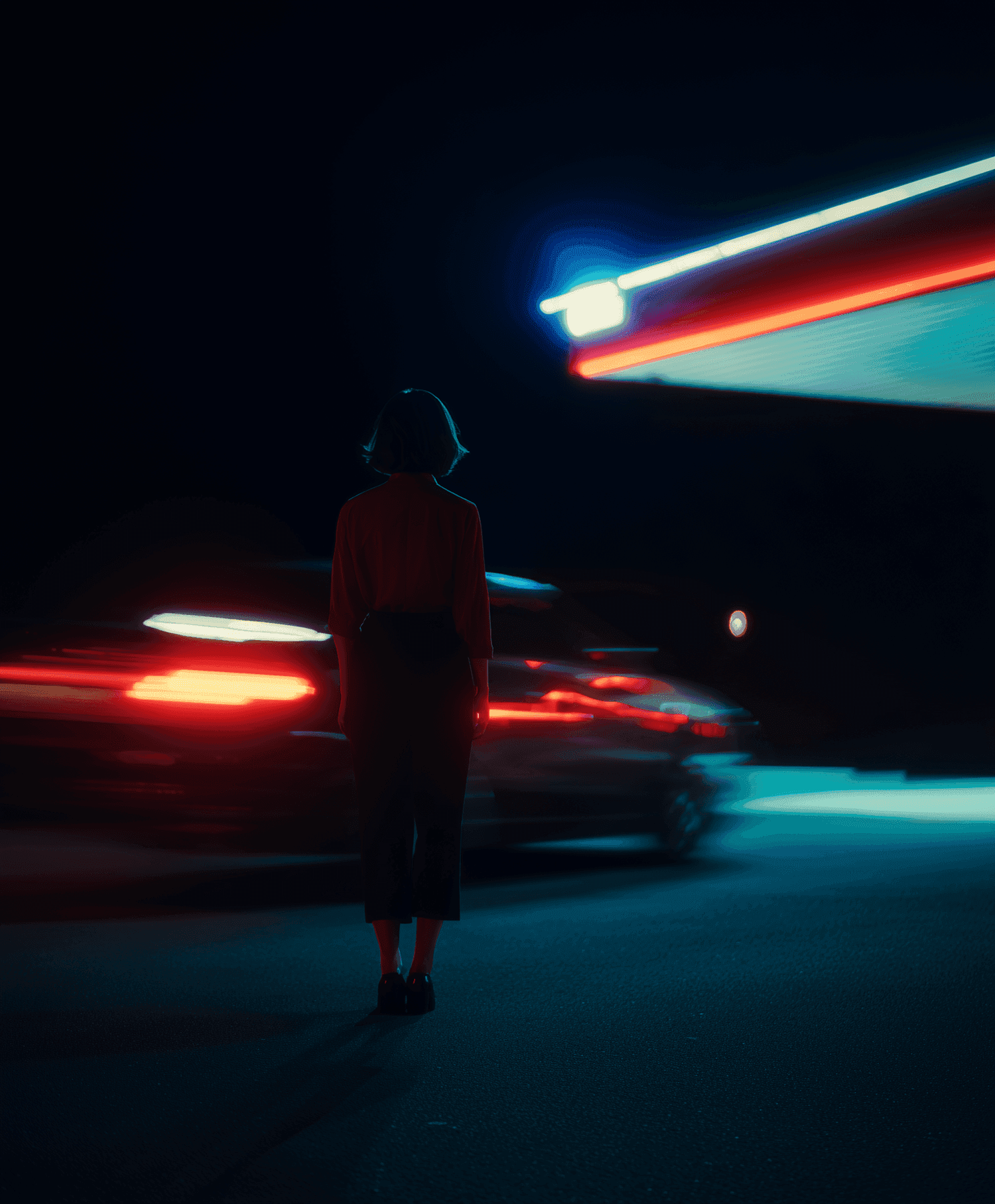 Woman standing at night beside a passing car under red and teal neon light